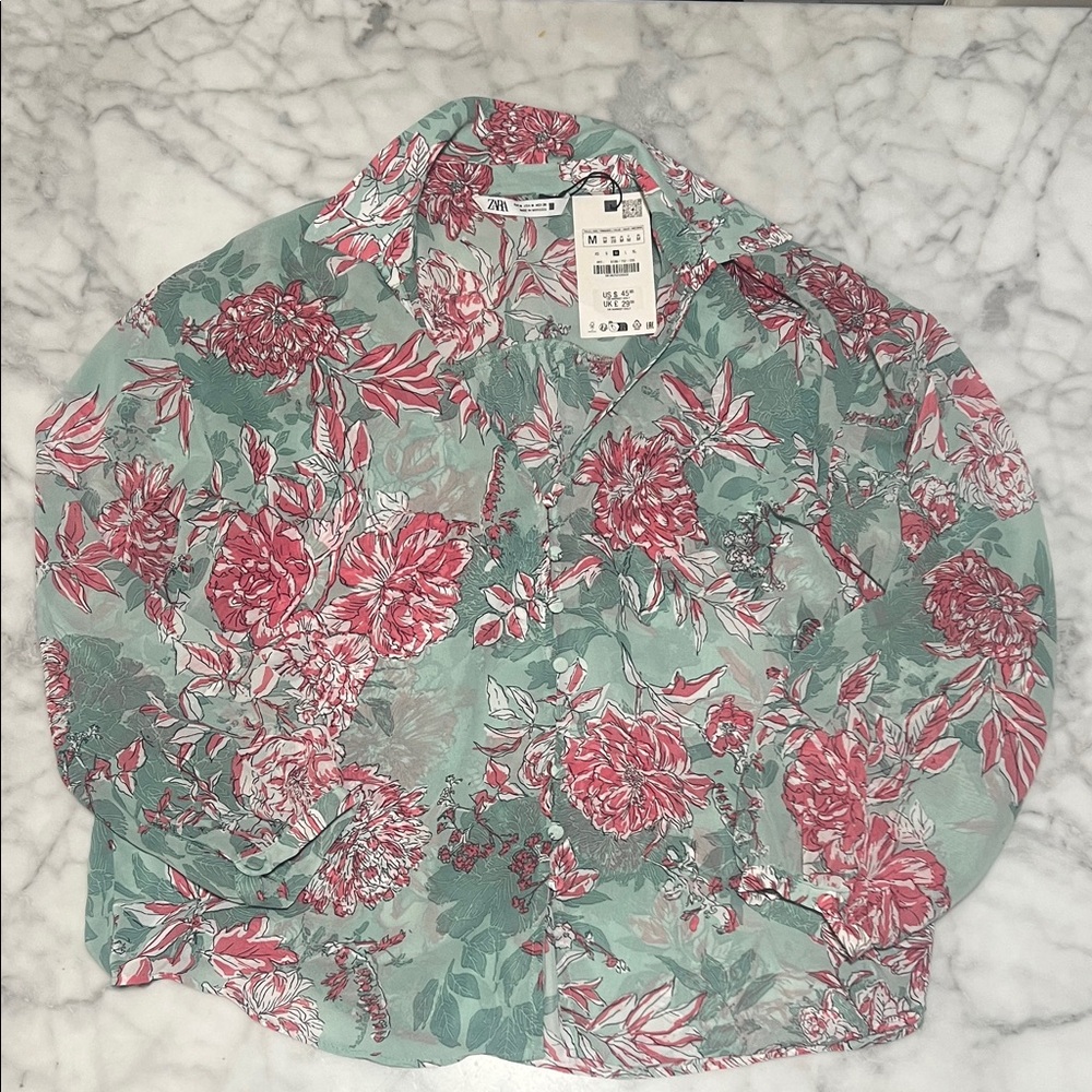 Zara pink and Green Floral Blouse. Button closure after open neck. Button wrist.